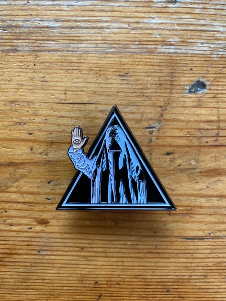 Image of Go Go Pins logo sticker with free hooded high five enamel pin