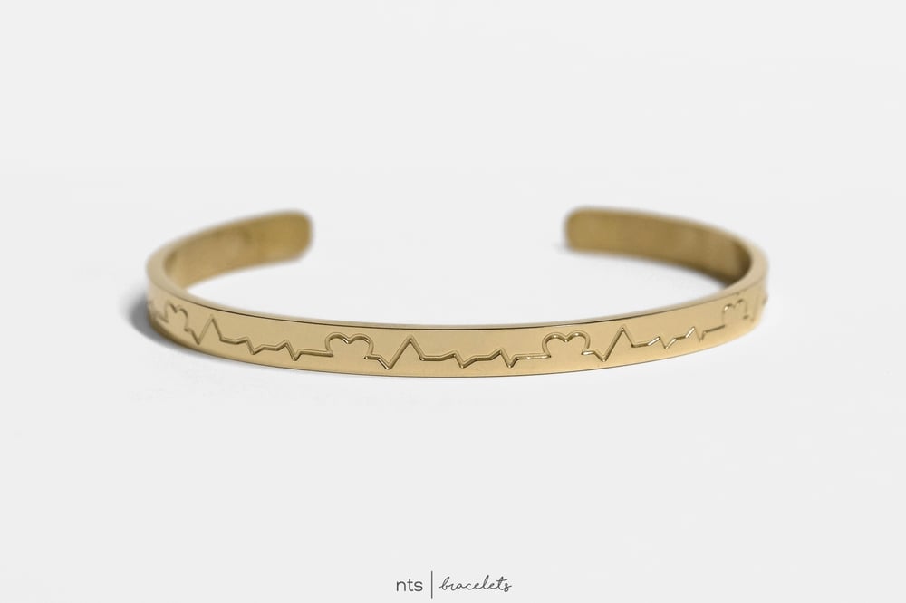 Image of GOLD EKG/HEART INSPIRED NTS BRACELET (Gold) 