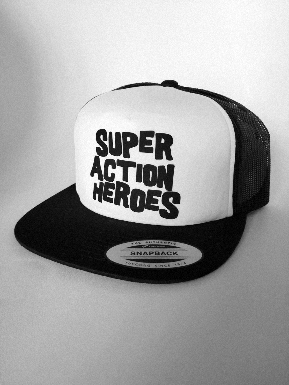 SUPER ACTION HEROES Logo Trucker Hat