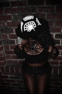 Image 1 of Spiderweb Ruffle Hat