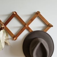 Image 1 of Accordian Hat Rack