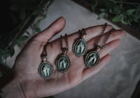 Image 1 of Tiny carnivore teeth necklace