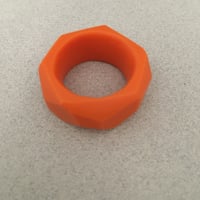 Image 4 of orange faceted geo ring