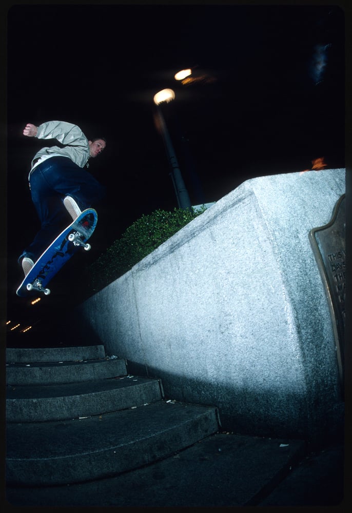 Julien Stranger, Union Square nose slide - San Francisco 1992 by Tobin Yelland