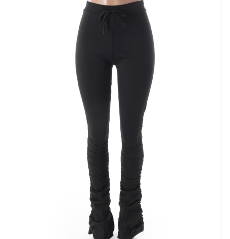 black stacked pants