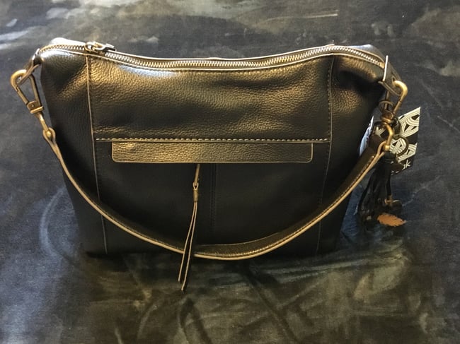 The sak top gold purse