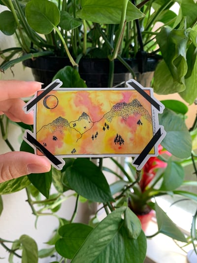 Image of sunsets & mountains sticker 
