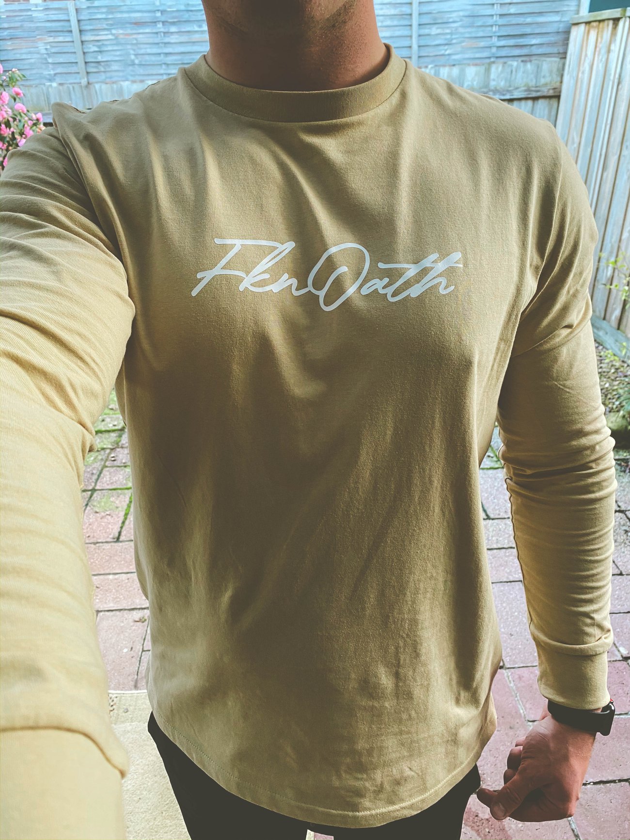 tan longsleeve shirt