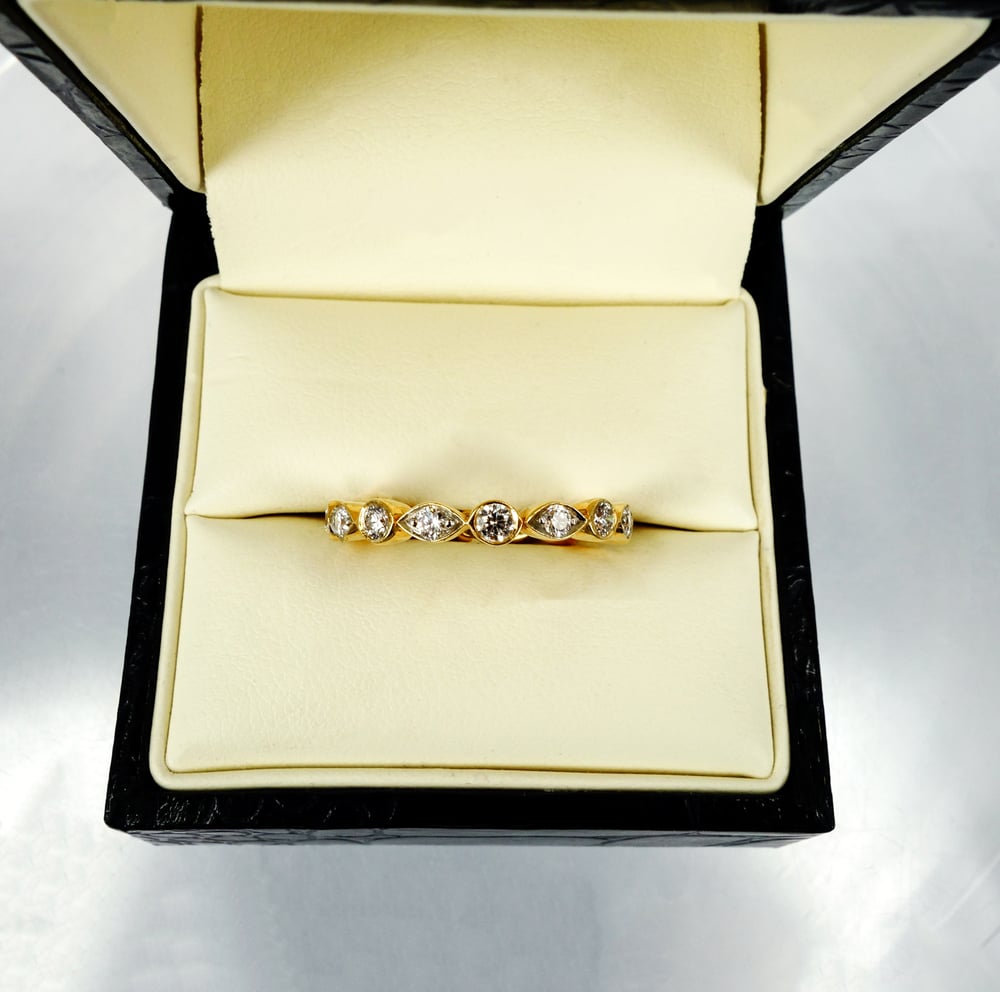 Image of 18ct yellow gold celebration style diamond ring 