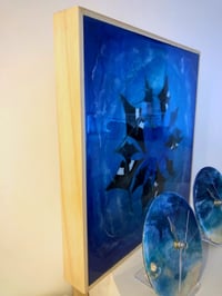 Image 5 of Manta rays in the blue.