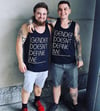 Gender doesn't define me tank tops