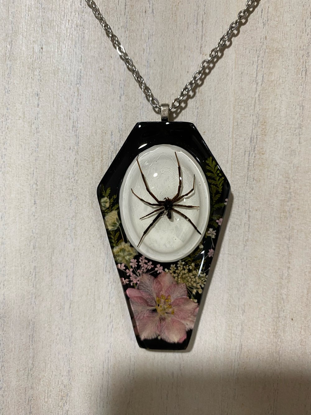 Black widow coffin pendant 