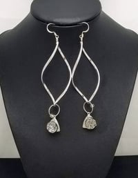 Image 1 of Swinging Twirls