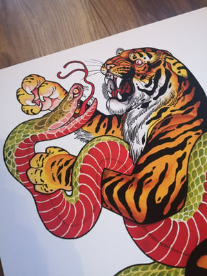 Image of A2 Classic snake and tiger. 