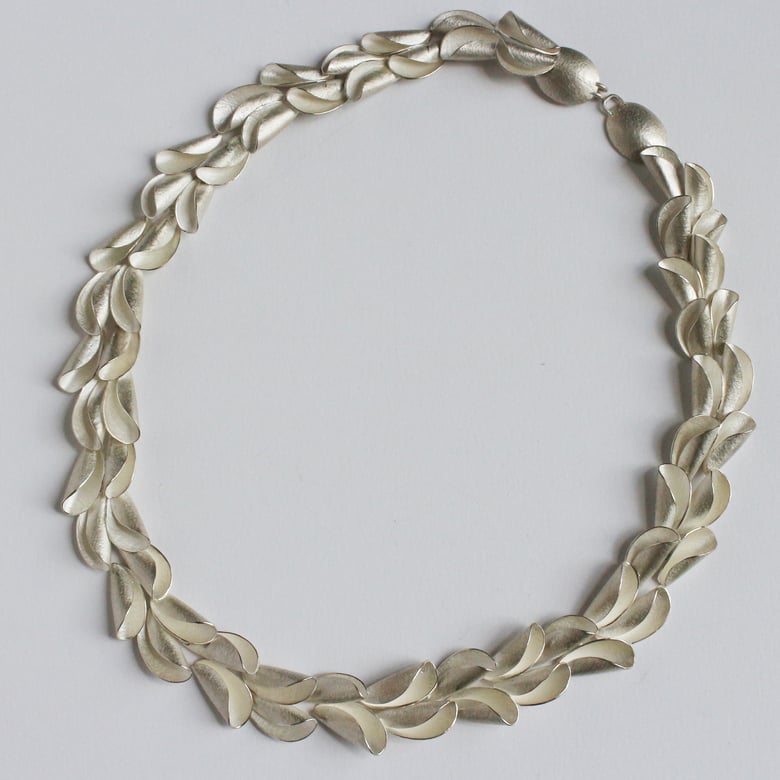 Image of curly shell silver necklace