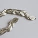 Image of curly shell silver necklace