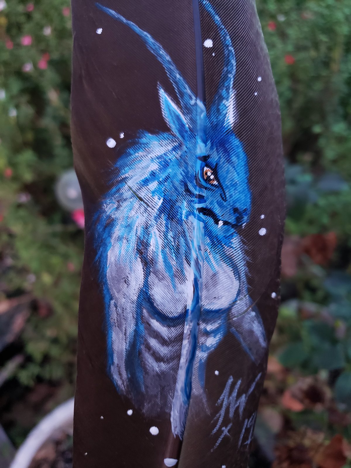 Image of Yeti on peacock feather “Grynhildi”