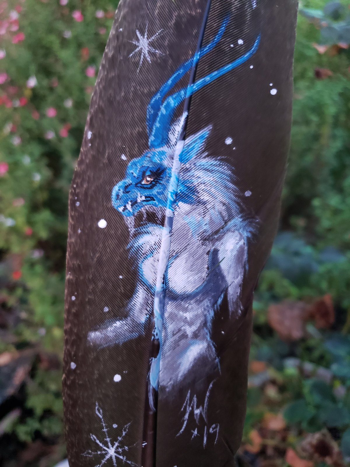 Image of Yeti on peacock feather “Gothha”