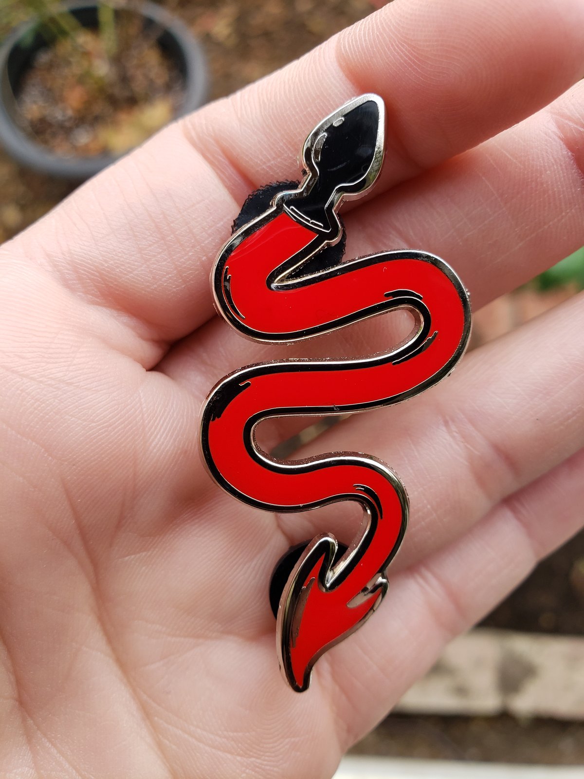 Image of The Devil’s Dungeon Enamel Pin in Red