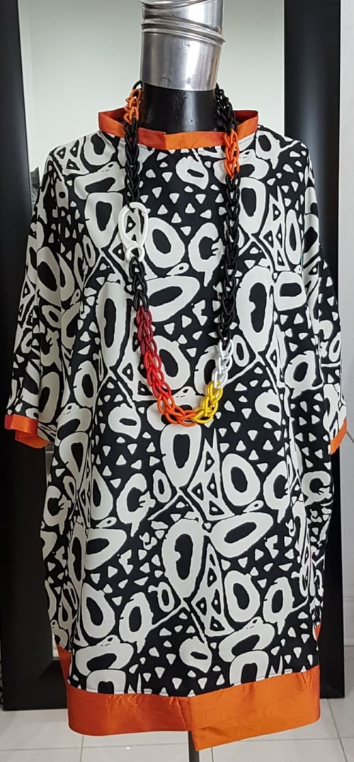 Image of oversized flowy summer top
