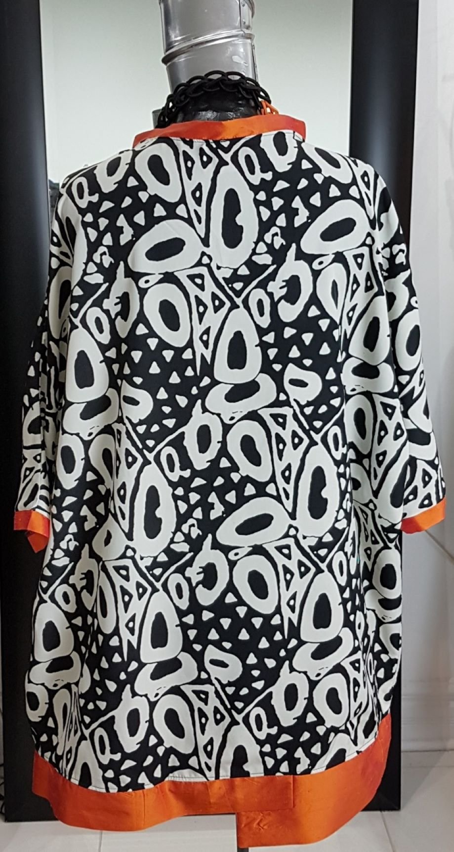Image of oversized flowy summer top