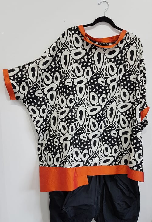 Image of oversized flowy summer top