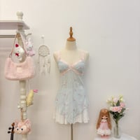 Image 1 of victoria’s secret floral asymmetrical hem top