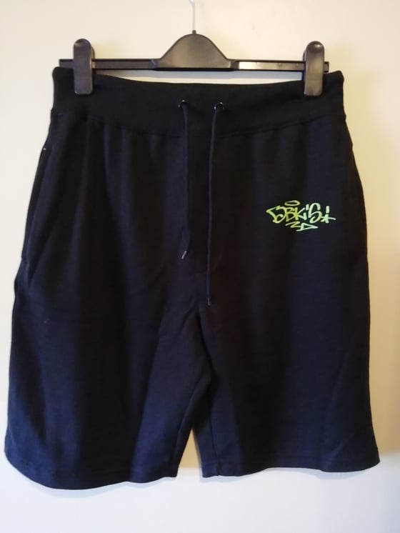 Image of DBK'S embroidered handstyle logo shorts