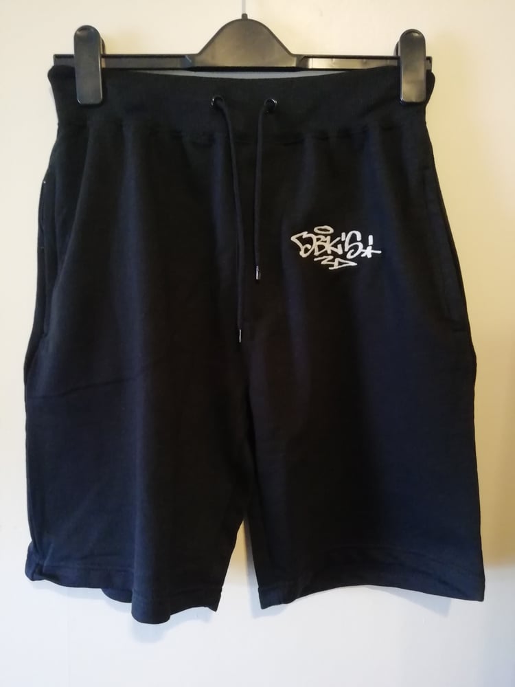 Image of DBK'S embroidered handstyle logo shorts