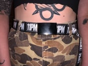 Image of 11 PM Records branded webbed belts