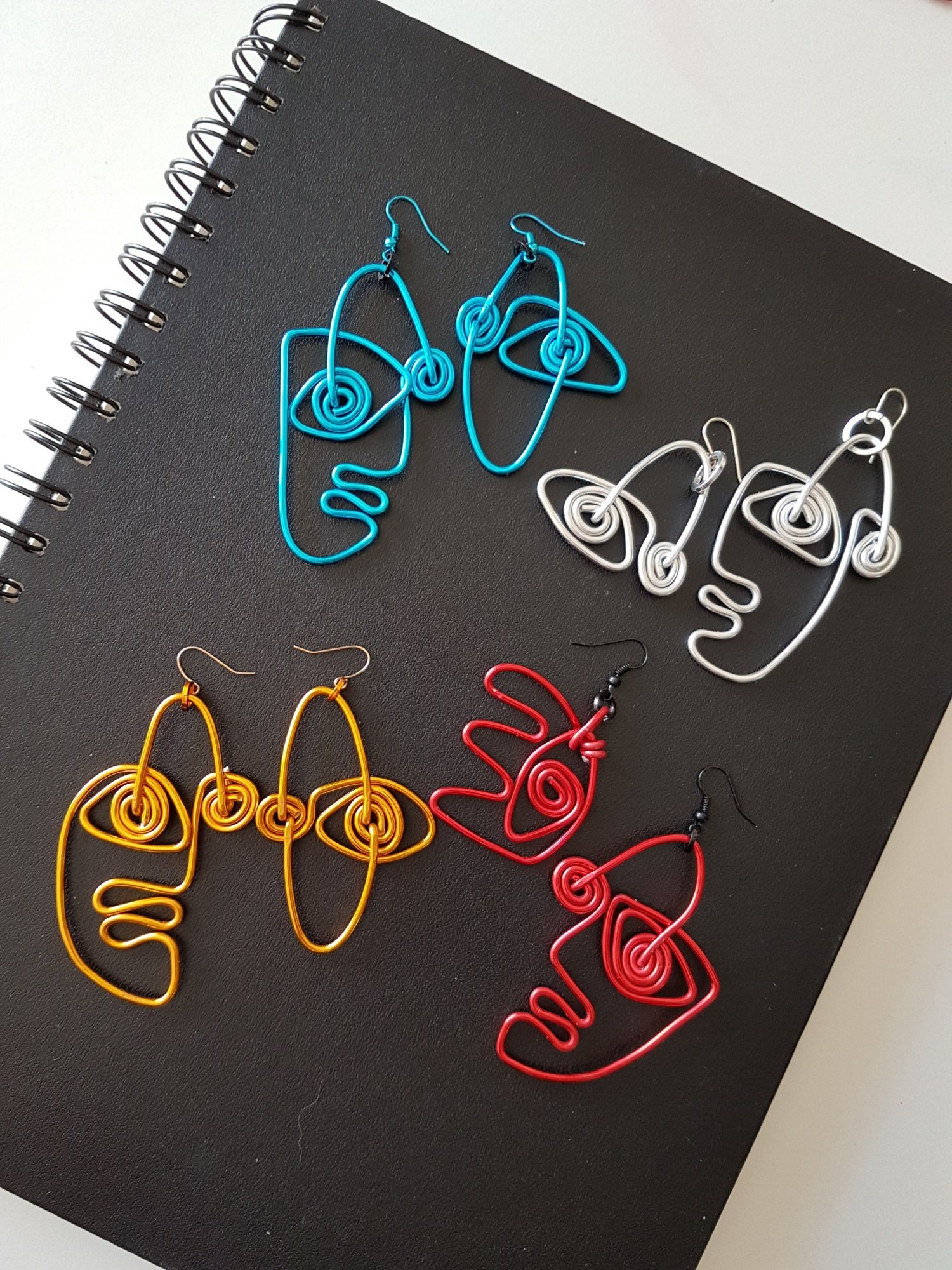 Image of doodle face earrings 