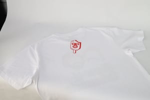 Image of “Sigue Quemando” Tee