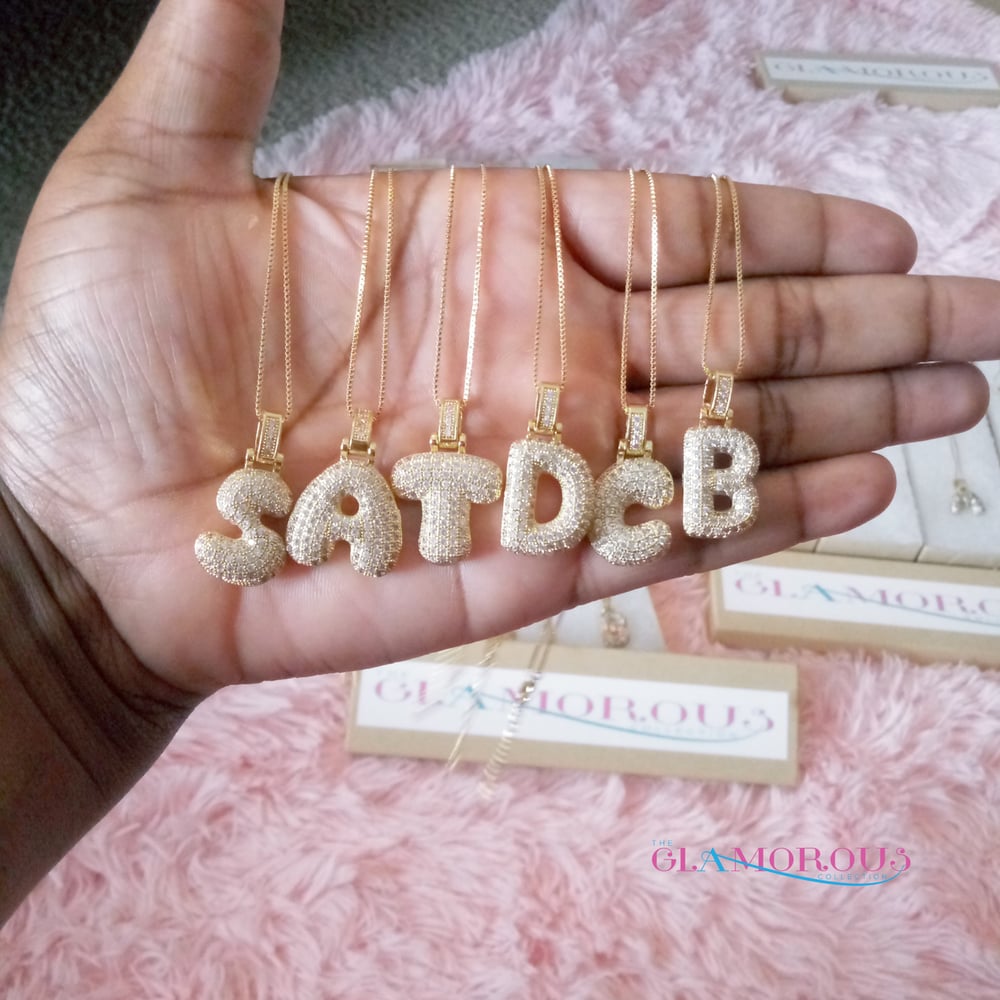Gold cubic letter necklace 