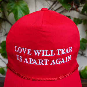 Love will tear us apart again hat