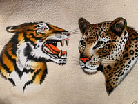 • TIGER AND LEOPARD •