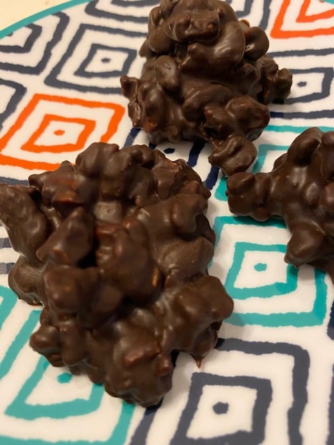 Dark chocolate fruit and nut cluster in a box