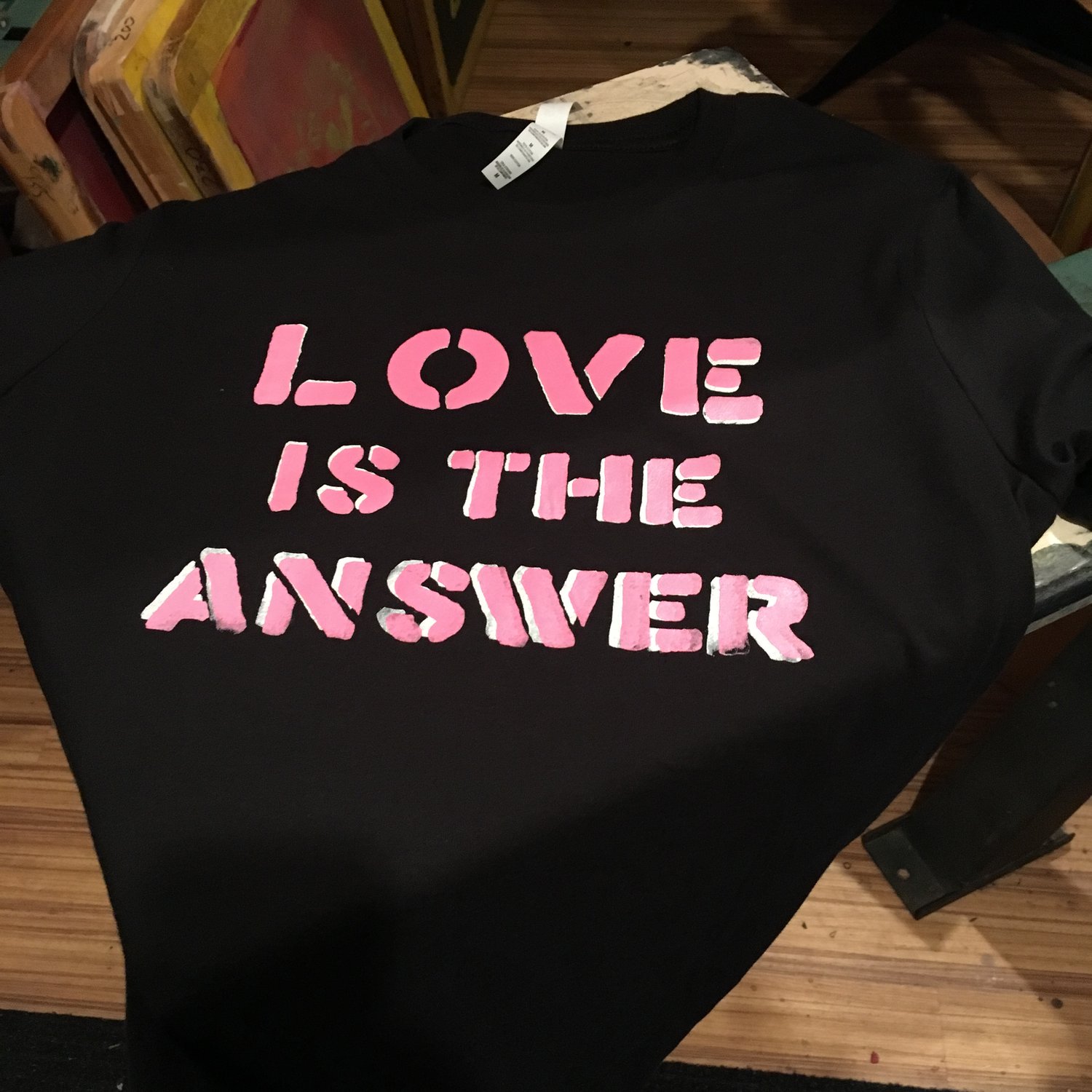 Love is the Answer- pink on black