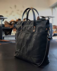 Image 1 of Black waxed canvas tote bag / office bag with luggage handle attachment leather handles and shoulder