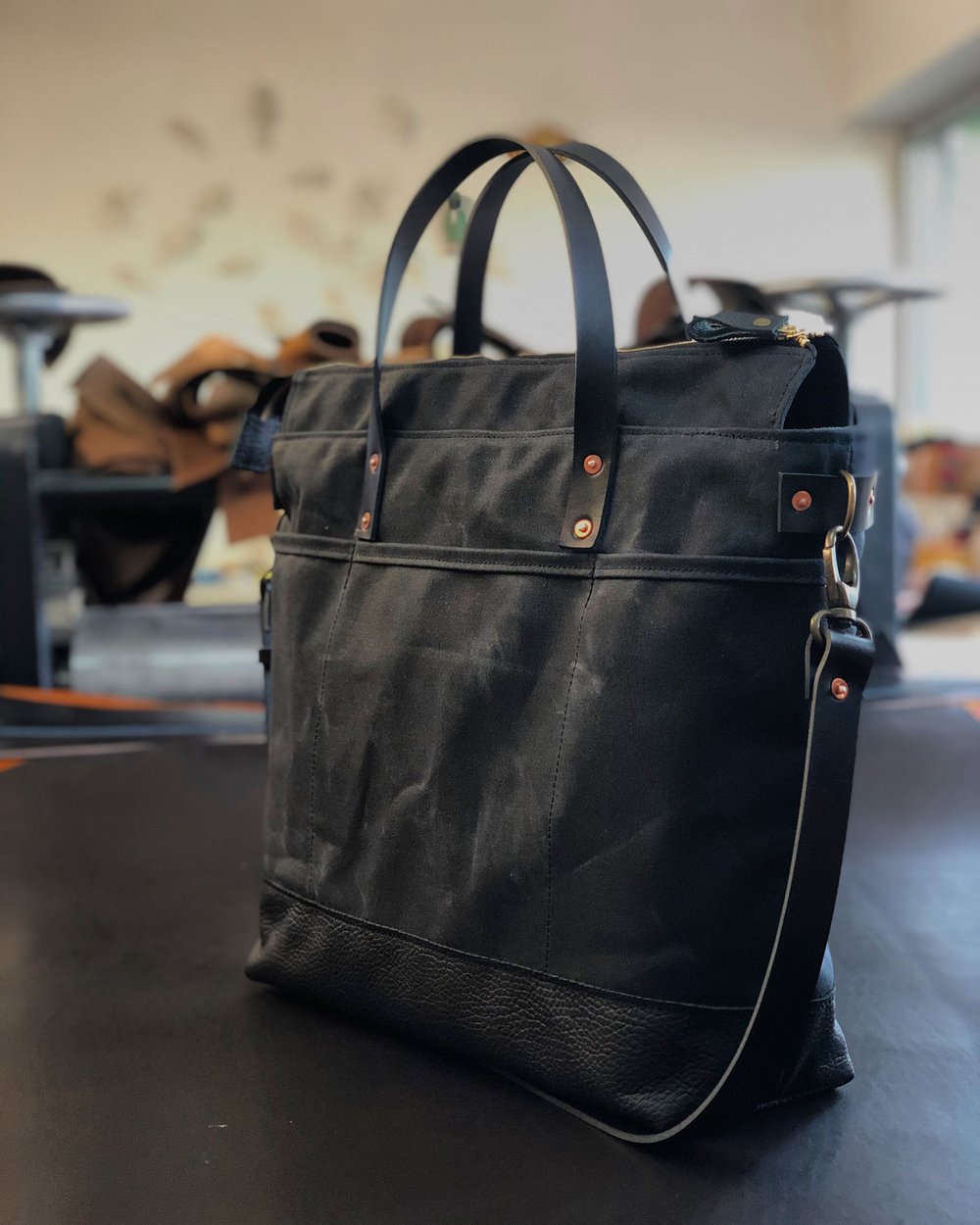 Black waxed canvas tote bag / office bag with luggage handle attachment  leather handles and shoulder