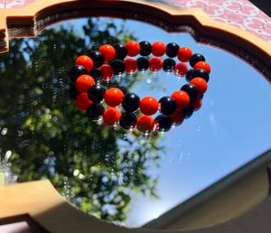 Orange and Black Bead Bracelet