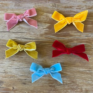 Image of Velvet bow clip to suit 38cm Miniland doll