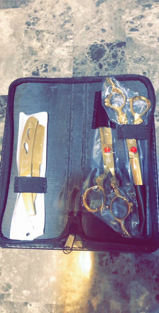 Image of G gold scissors and blade 