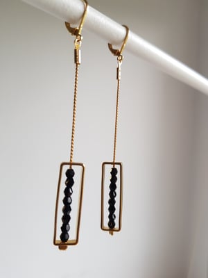 Image of Ana. Pendientes largos con cristales de Swarovski.