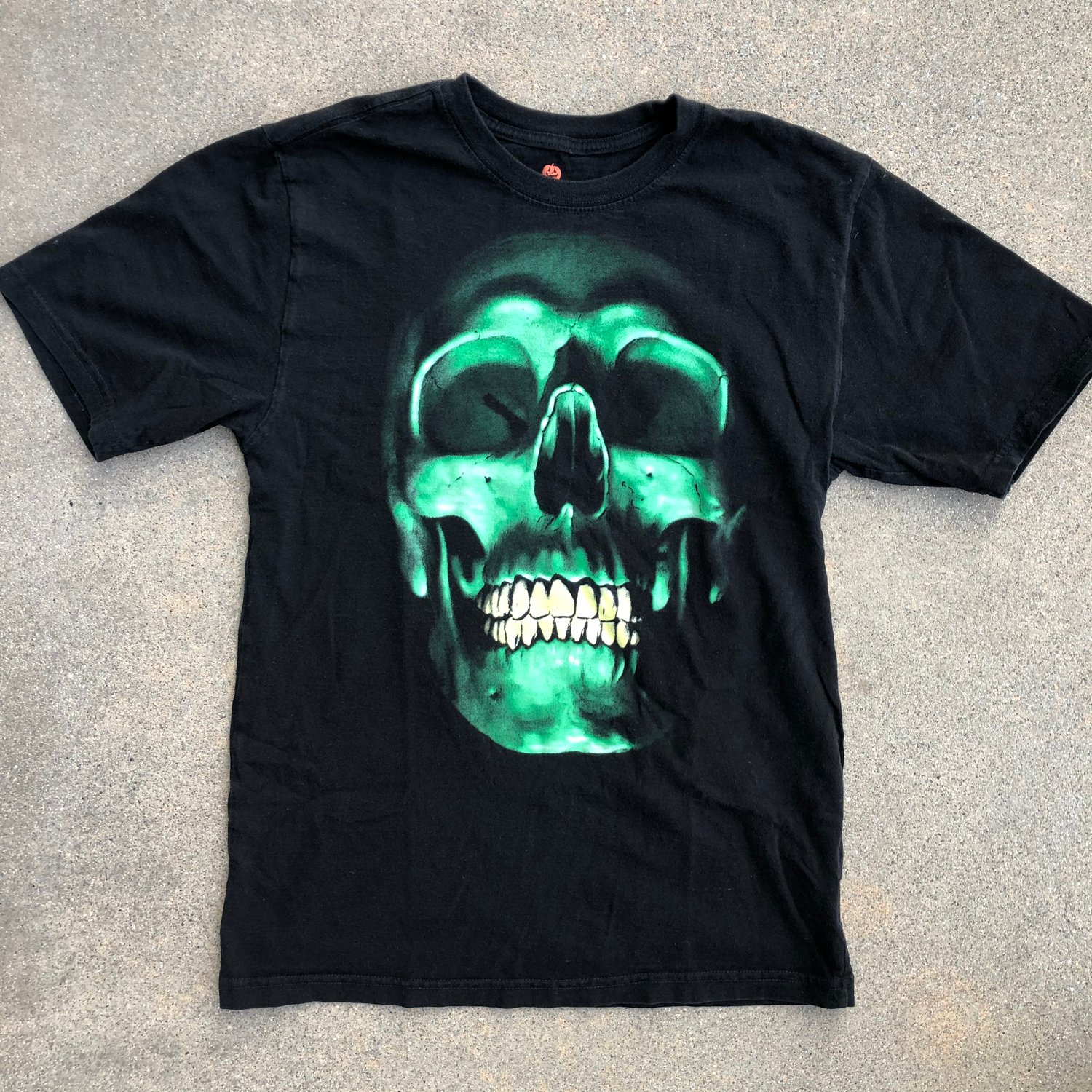 Image of Eerie Green Skull Tee