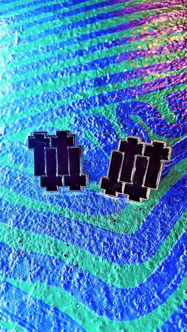 Image of Outer Heaven enamel pin
