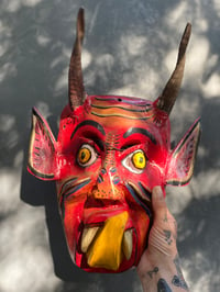 Image 1 of Hand painted yellow tongue devil head 