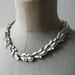 Image of curly shell silver necklace