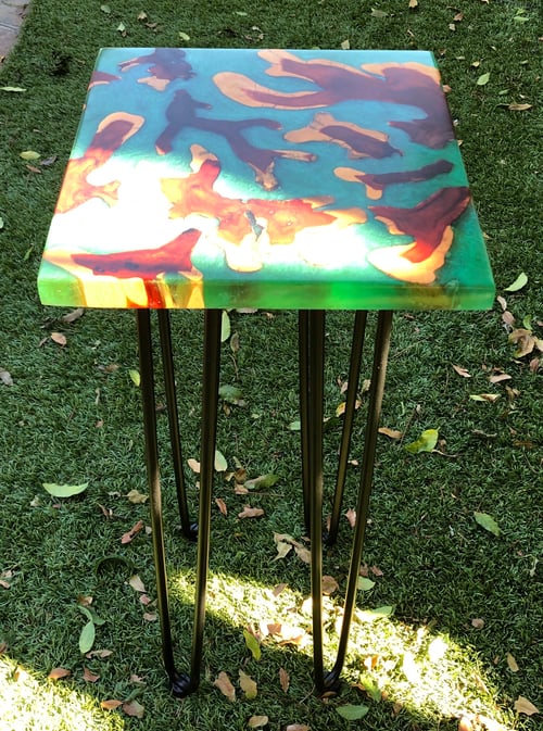 Image of Brasiletta and green resin table