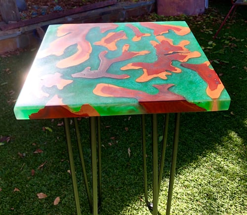 Image of Brasiletta and green resin table