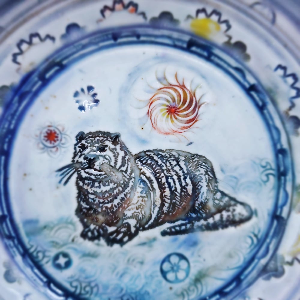 porcelain otter